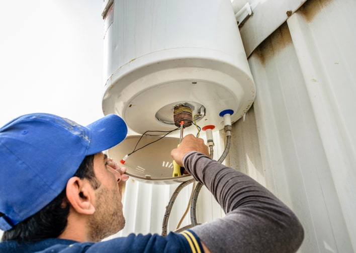 Tanked water heater service and maintenance in Whitby, Ajax, Oshawa, Pickering and area